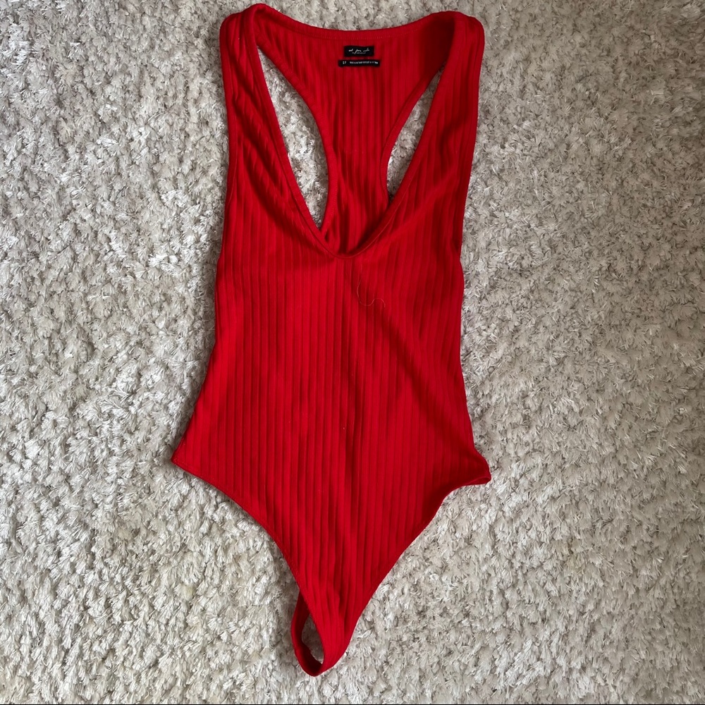 Red V neck body suit